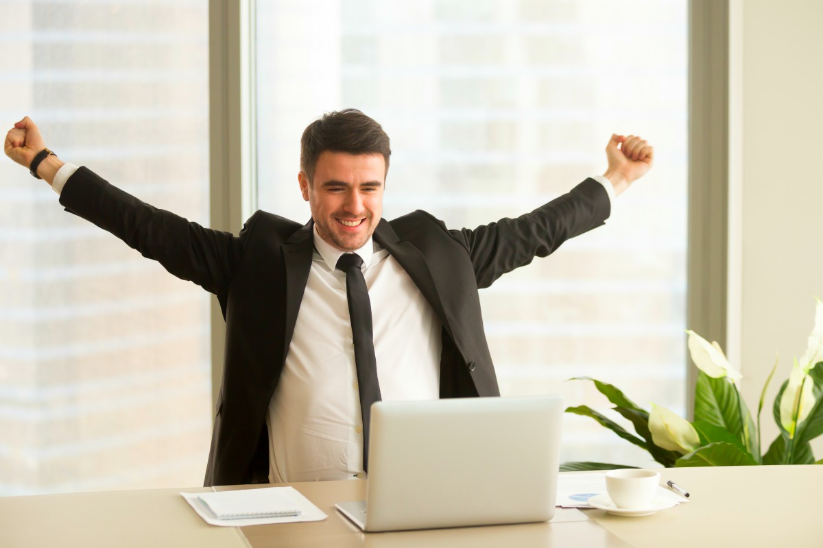 happy businessman raising hands | Secrets of Successful Business Sales Development Leaders | business development manager | business development jobs